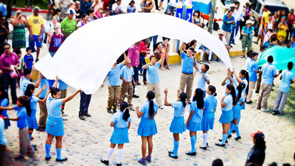 Schoolkids performing in the parade